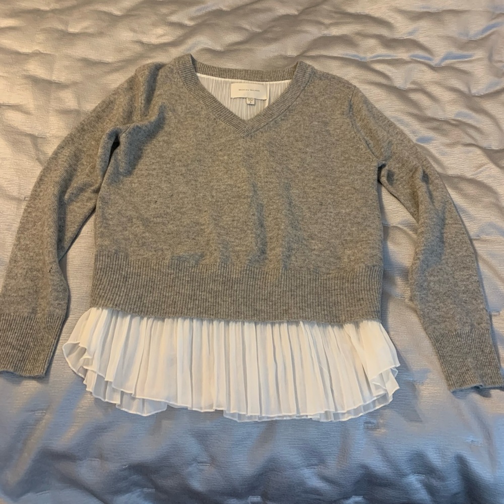 Gorgeous cashmere sweater by Brochu Walker with pleated design at waist.